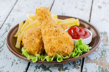breaded chicken drumstick french fries leg