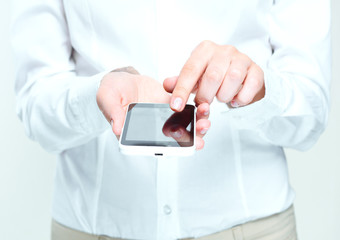 female hands holding mobile phone.
