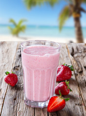 Fresh milk shake on wood