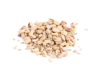 Glass bowl with unpeeled pistachios.