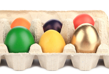 Colorful Easter Eggs in box.