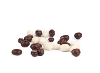 Dark brown dragee in chocolate cover.