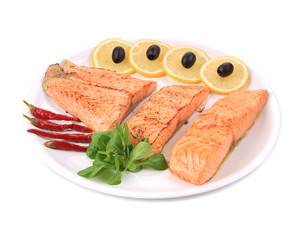 Grilled salmon fillets with rosemary.