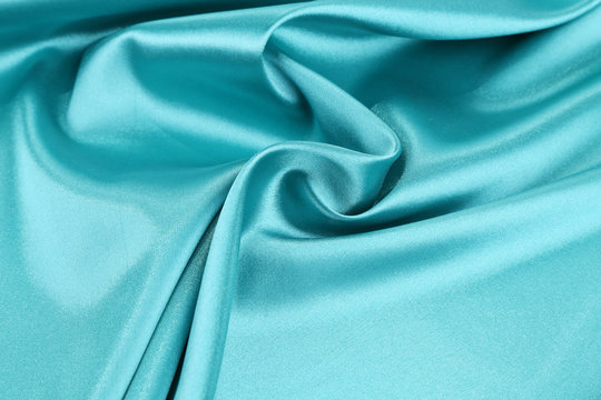 Soft Folds And Highlights Of Light Blue Silk.