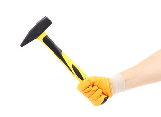 Hand in glove holding hammer.