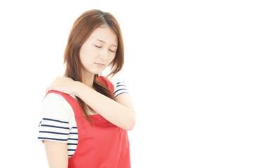 肩痛を訴える女性