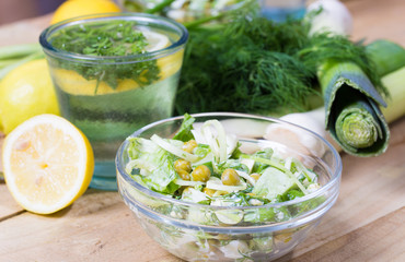 lemonade with parsley and bowl of vegetarian salad