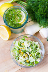 lemonade with parsley and bowl of vegetarian salad