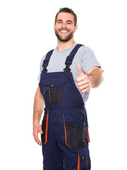 Portrait of smiling worker in blue uniform