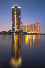 Fototapeta na wymiar High-rise apartment buildings by the Chao Praya river