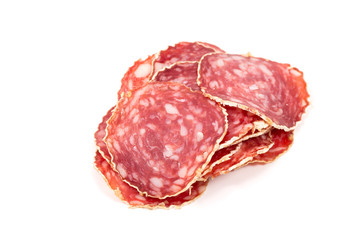 Slices of salami sausage on a white background