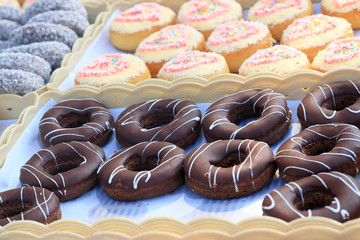 A lot of tasty chocolate donut