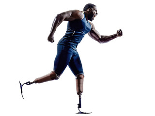 handicapped man runners sprinters with legs prosthesis silhouett