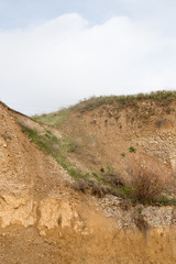 background of rocks from clay and stone after a landslide