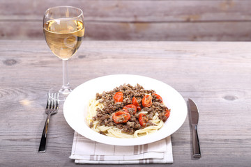 White wine and spaghetti with meat