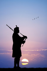 Pipers at sunset - obrazy, fototapety, plakaty