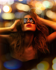 Fototapeta premium fashionable woman in nightclub