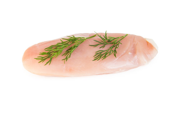 Piece of raw chicken with dill