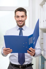 businessman with folder at office