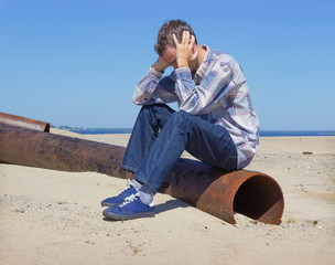 Lonely young man suffering from depression