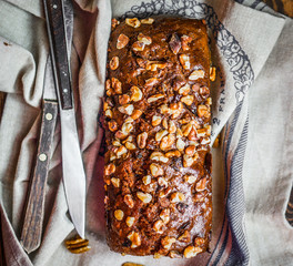 Homemade nut cake on wooden background