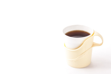 coffee poured into a paper cup