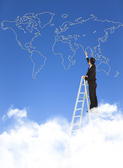 Business man standing a stepladder and drawing  global map