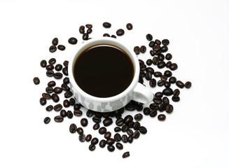 hot coffee in the white cup and coffee bean on white background