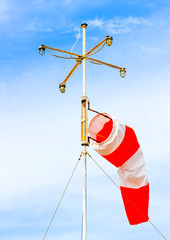 wind indicator becide the port of island Poros in Greece