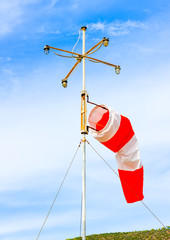 wind indicator becide the port of island Poros in Greece