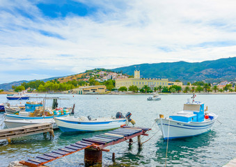 Wooden pier with fishing boats at Poros island in Greece