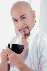 handsome  beautiful mustache Holding coffee black cup