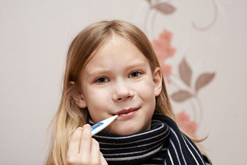 Little girl with thermometer