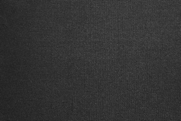 black background of synthetic fabric