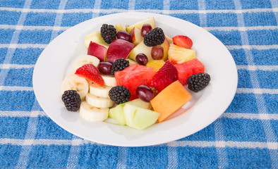 Plate of Fresh Cut and Whole Fruit