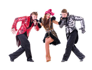 Actors dressed like a devil and demons posing on an isolated