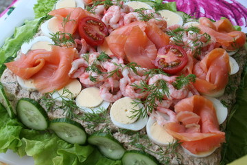 Sandwich gateau with smoked salmon and shrimps