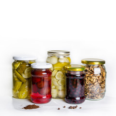 Group of homemade preserves canned goods in mason jars