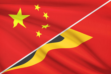 Series of ruffled flags. China and Republic of Timor-Leste.
