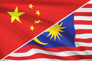 Series of ruffled flags. China and Malaysia.