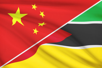 Series of ruffled flags. China and Republic of Mozambique.