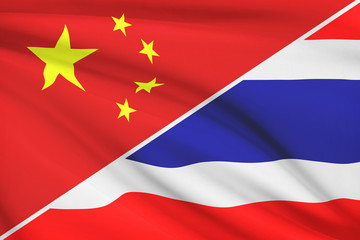 Series of ruffled flags. China and Kingdom of Thailand.