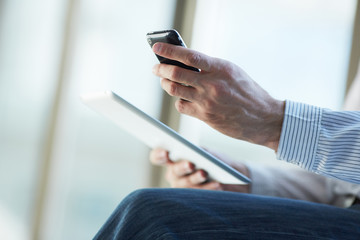 man holding digital tablet