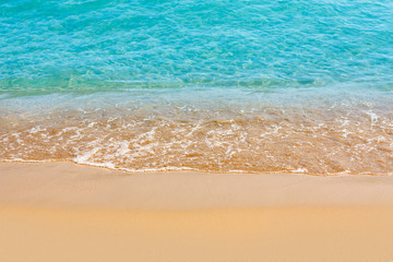 Beautiful water of the sea and yellow sand