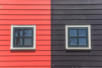 Fototapeta na wymiar Windows of colorful houses