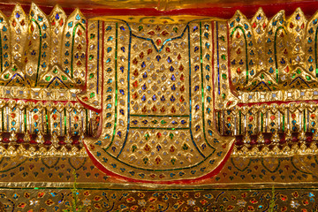 Obraz premium Traditional Thai style art gold painting pattern in Temple Bangk