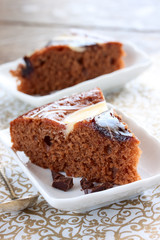 cake with chocolate glaze on the table
