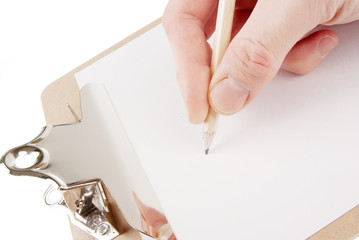 Hand writing on empty document in a clipboard