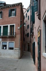 Fototapeta na wymiar One of the narrow old streets of Venice, Italy.