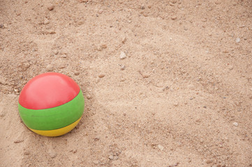 the ball in the sand